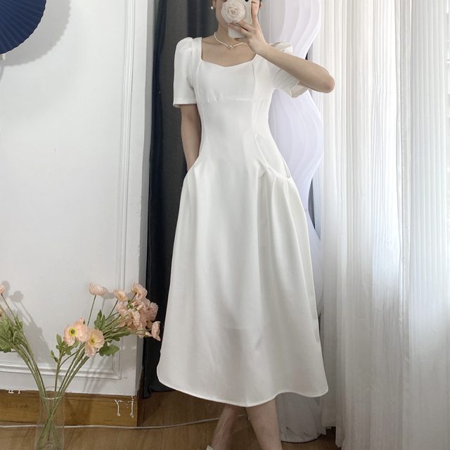 a line white dress with sleeves