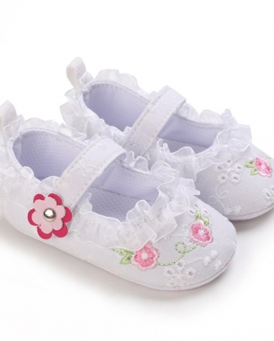 white pram shoes girl