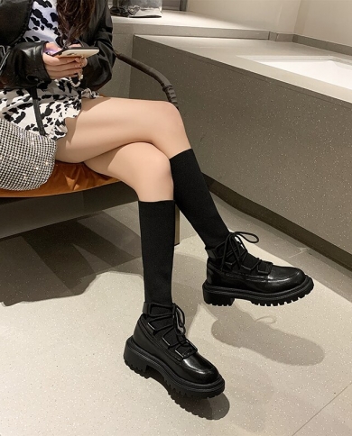 flat sole black boots