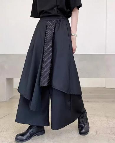 אופנה בגדי רחוב נשים מכנסיים שחורים חצאיות 2023 פס ניגודיות צבע טלאים מכנסיים באורך קרסול רופפים לא סדיר
