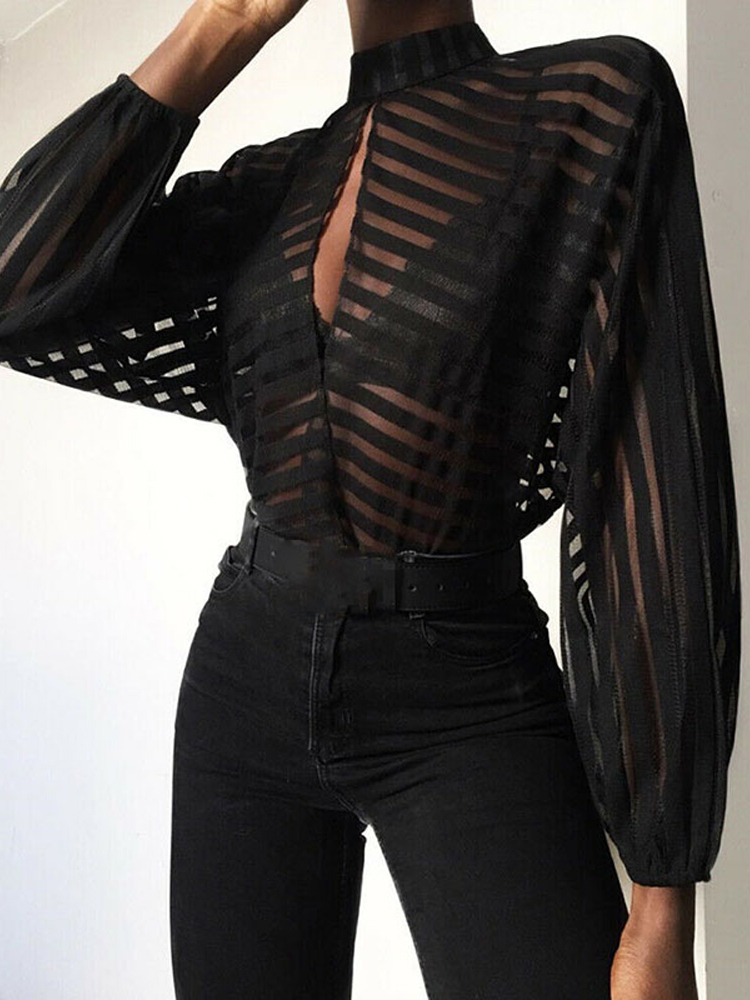 women in sheer blouses
