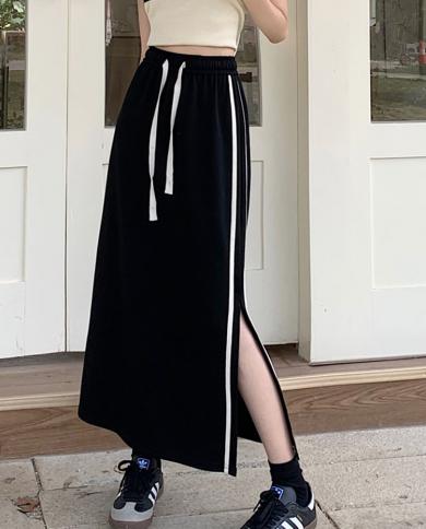 טיגנה חצאית מזדמנת ארוכה לנשים 2023 אופנה חדשה פס אנכי צד מפוצל חגורת קו מותן גבוה חצאית מידי נשית