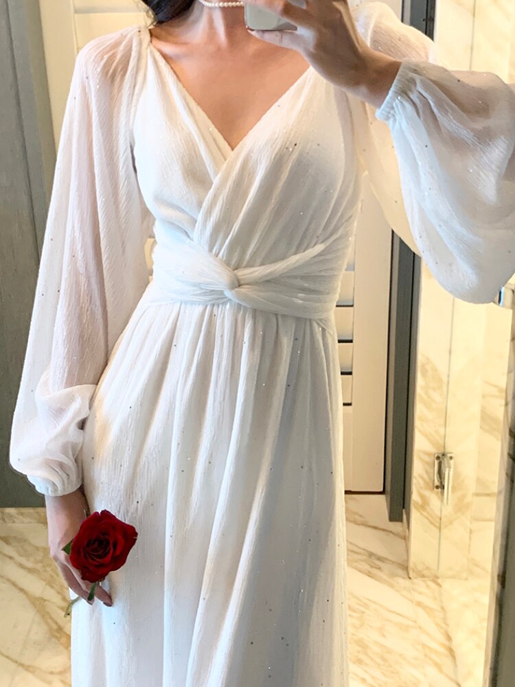 a line white dress with sleeves