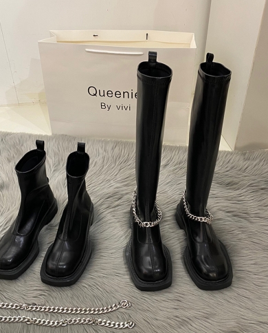 Flat heel riding boots store