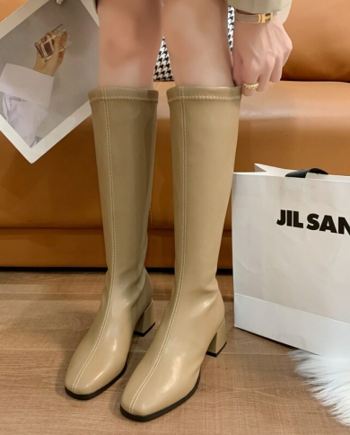 Heeled rubber top shoes