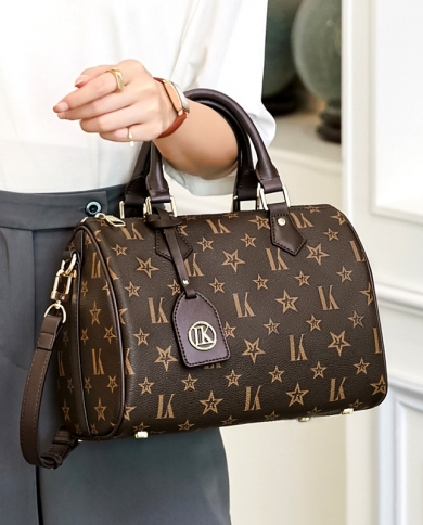 Luxury Handbags & Top Handles