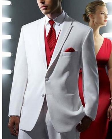 White tux with red store vest and bow tie