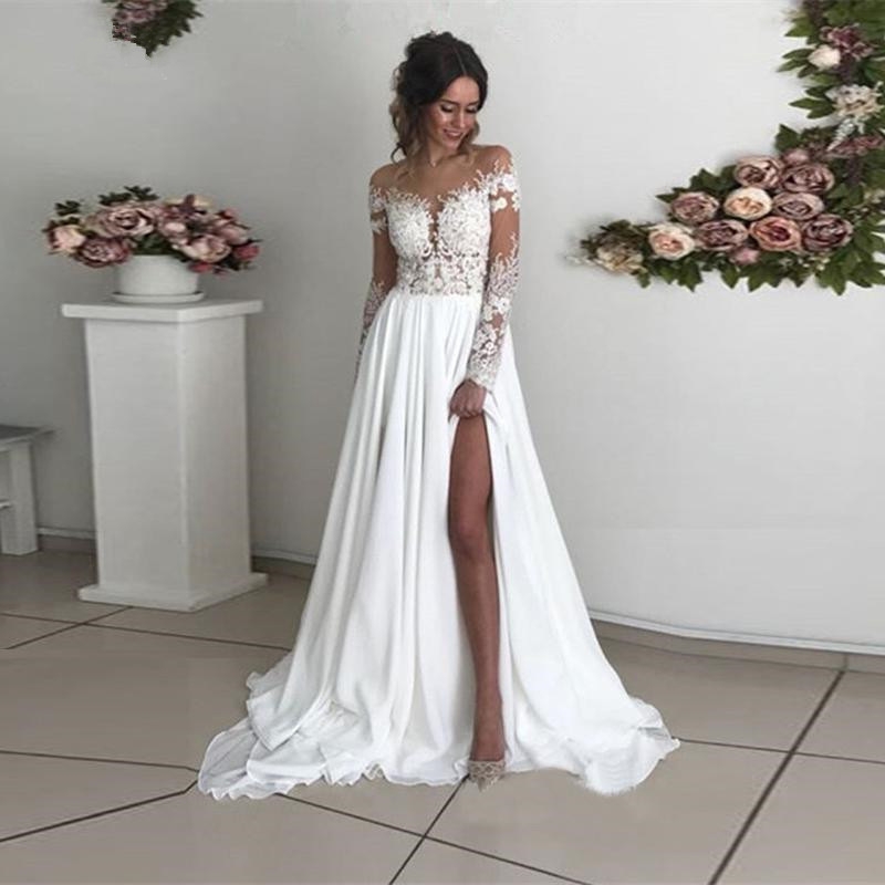 Long sleeve see through lace wedding dress hot sale